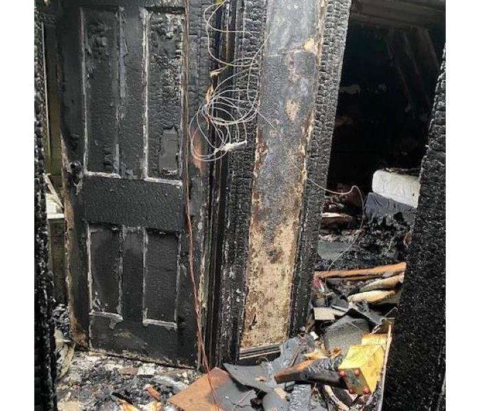 House with burned walls from a fire