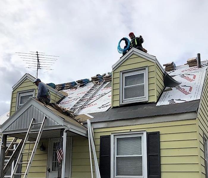 House with roof damage