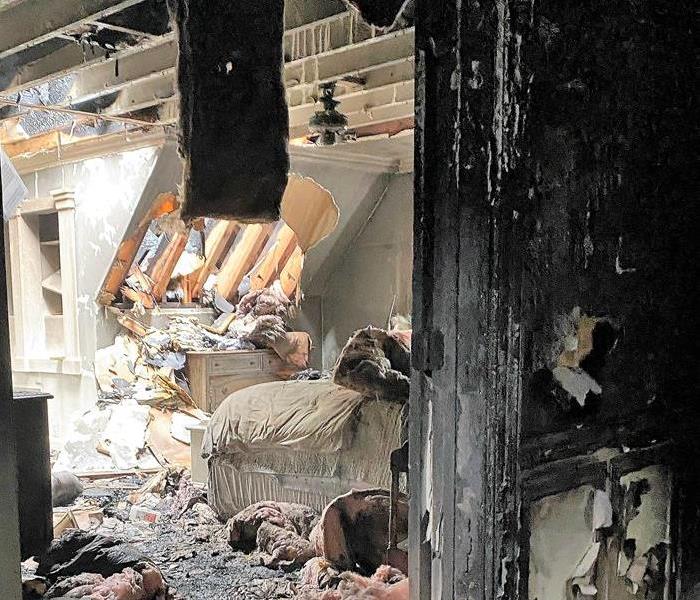 house with smoke and soot damage from a fire