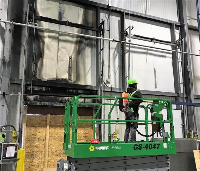 Servpro team cleaning a warehouse